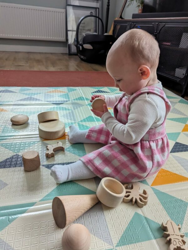 Little Ones: baby playing with bespoke children's box