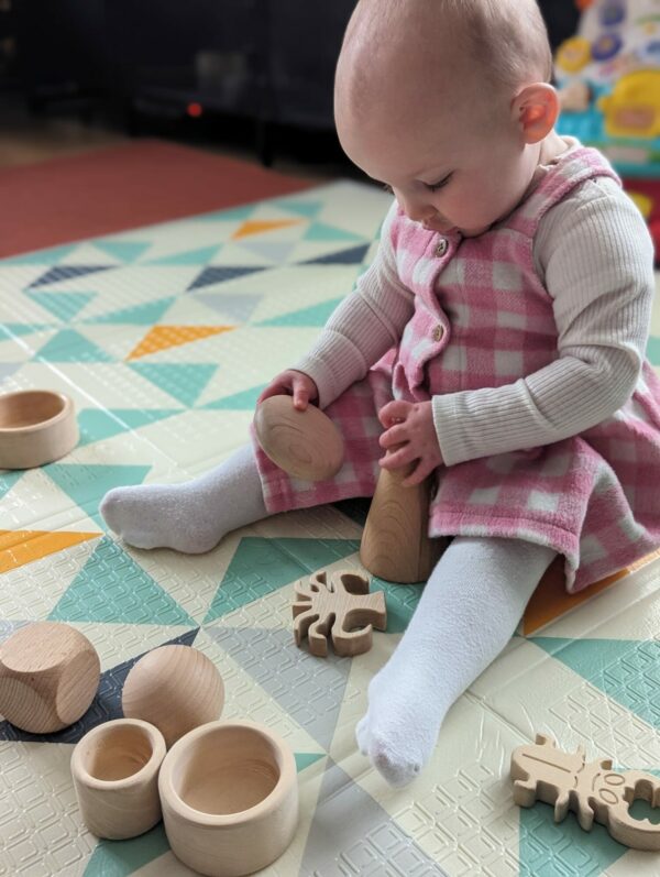 Little Ones: baby playing with bespoke children's box