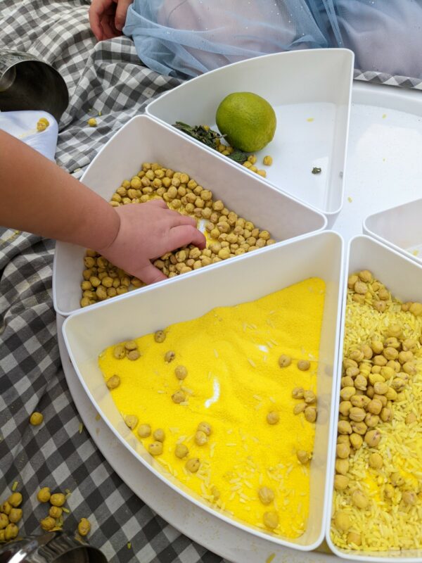 Little Ones: yellow sensory chickpeas and sand in an inspire my play tray